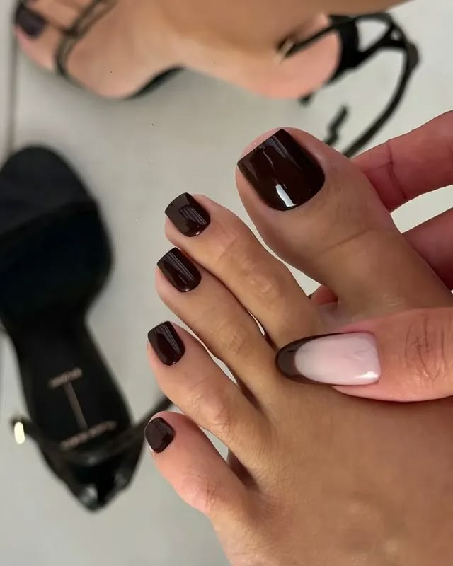 Dark brown bold pedicure colors.