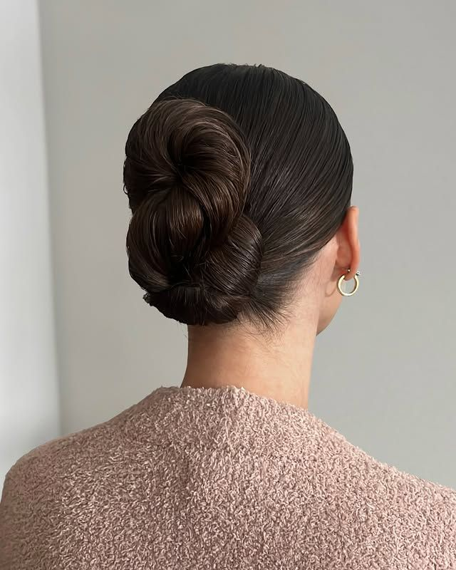 Must-see sleek, slicked back hairstyles to turn heads. sleek-slicked-back-twisted-updo