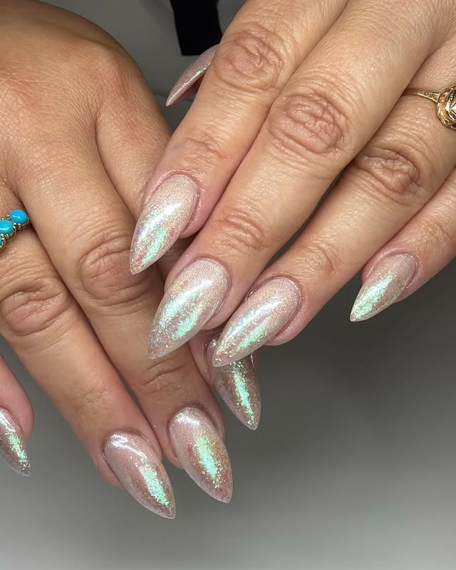 Glittery birthday nail ideas.