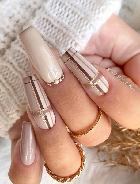 beige plaid nail design for christmas holiday manicure idea