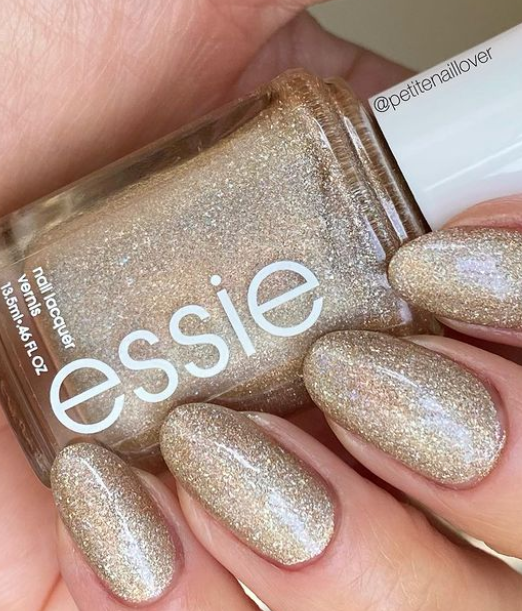 gold glitter nail polish ideas for christmas winter holidays manicure. essie nail polish colors.