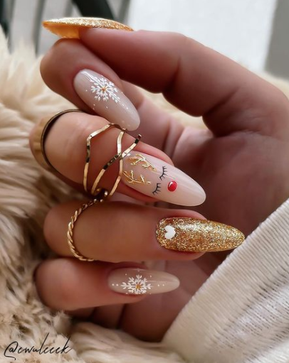 gold glitter reindeer christmas nail designs. christmas nail ideas. winter holiday nails acrylic.