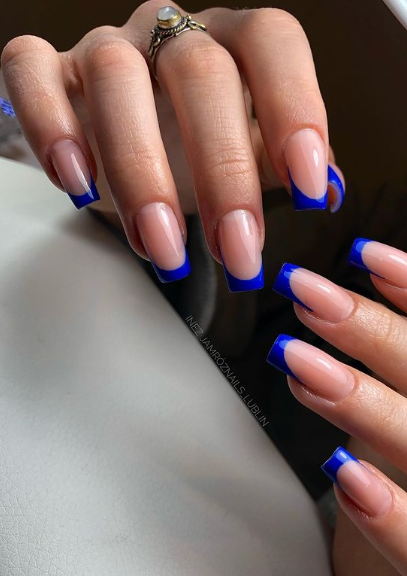blue tipped nude nails. nude nail ideas and trends. nude nails coffin acrylic.