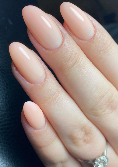 classic nude nails simple. peach nude nails almond. nude nail trends