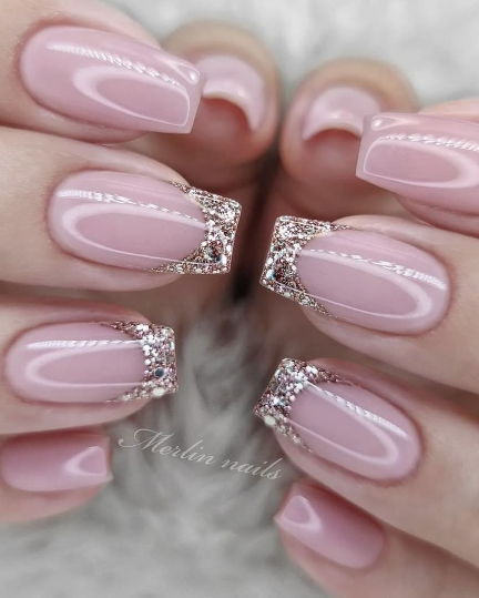 french glitter tipped pink nails. nude nails for wedding. wedding nails pink and glitter. glam wedding nails nude.