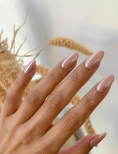 glazed donut pink hailey bieber nails. pink chrome mirror wedding nails. nude neutral nails soft pink.