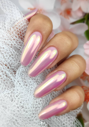 glazed donut pink hailey bieber nails. pink chrome mirror wedding nails. bridal nails. 