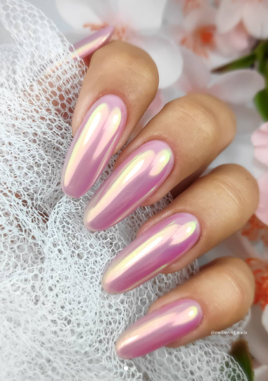 glazed donut pink hailey bieber nails. pink chrome mirror wedding nails. bridal nails.