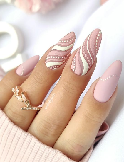 nude nails acrylic. nude swirl design nails. pink nude mauve nail ideas.