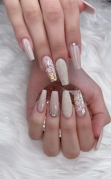 nude pink nails. snowflake christmas winter nails. pink glitter neutral coffin nails. winter wedding nails