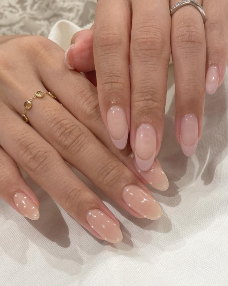 nude wedding nails. neutral pearl almond nails.