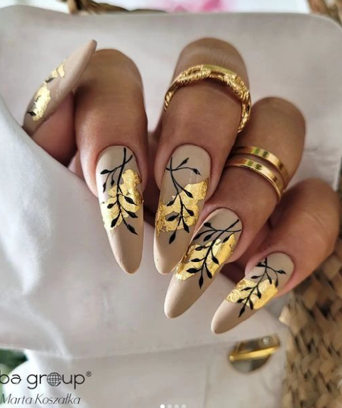 fall gold leaves branches nail art. october nail ideas. autumn nail art.