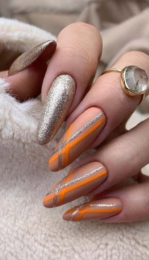 gold and orange fall nail design. fall nails. september nails. autumn nails almond.