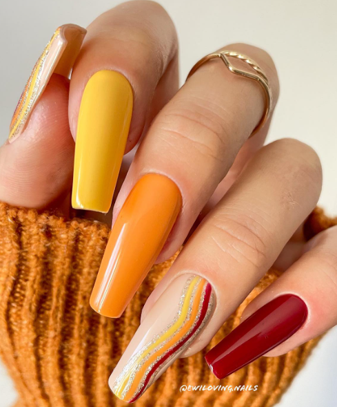 yellow and orange fall nail ideas. fall coffin acrylic nails.