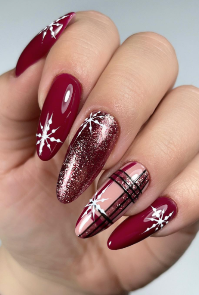 pink and red winter festive nails. christmas nail designs. december nails. plaid christmas nails.
