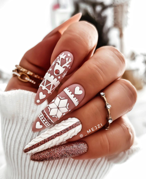 pink and white winter nail art. christmas nails design ideas snowflakes and reindeer.acrylic christmas nails. 