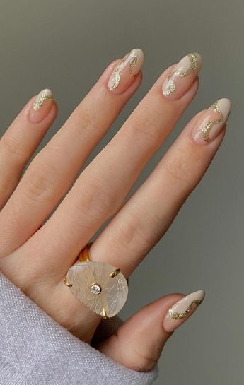 gold swirl marble nude nails. wedding nails. bridal nail designs with gold and pink. trendy nails simple.