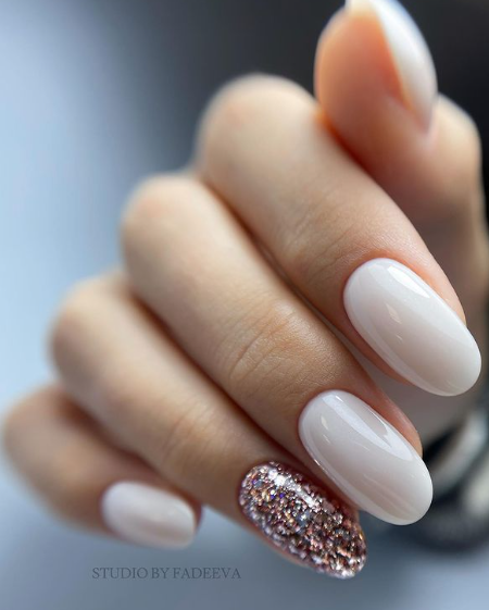 ivory cream nude nails wedding. bridal nail ideas. glitter nude nails. trendy nails simple almond short.