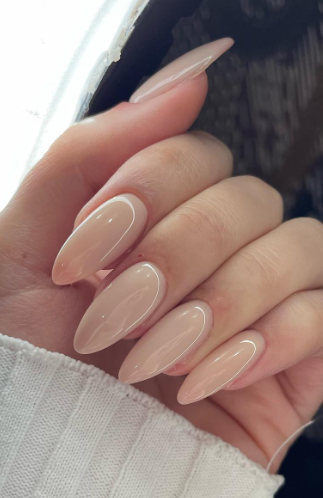 nude minimal pink beige nails. wedding nails acrylic pointed. bridal nail ideas. nude nails for bride.