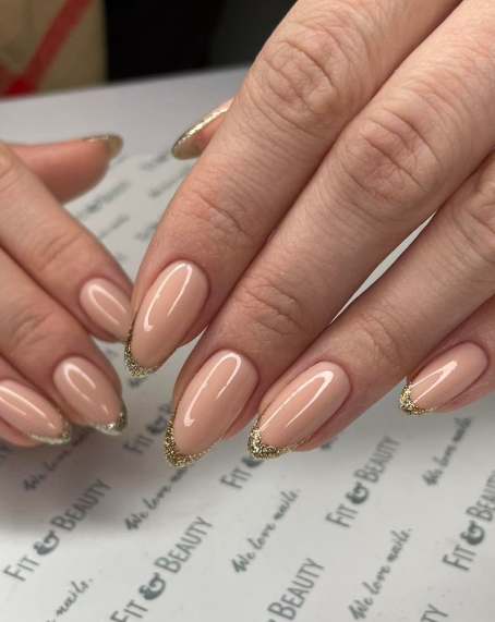 nude warm pink gold tipped nails. glam wedding nails with glitter. bridal nail designs. trendy nails.