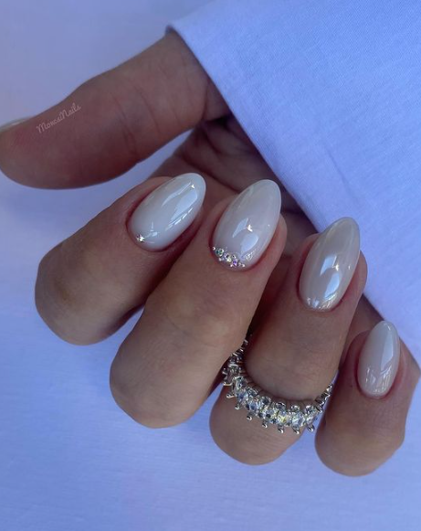 nude wedding nails with glitter cuticles. almond bridal nails. trendy minimal nail designs.