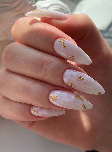 pink marble nails with gold flakes. wedding nail ideas. bridal nails marbled almond acrylic.