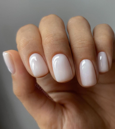 simple short nude wedding nails. ivory bridal nails short. nude nails minimal simple trendy.