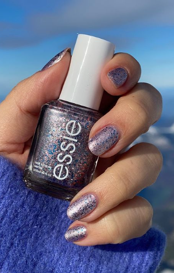 Essie Congrats nail polish. purple glitter nail polish. winter nails. january nails. shimmer nails simple.
