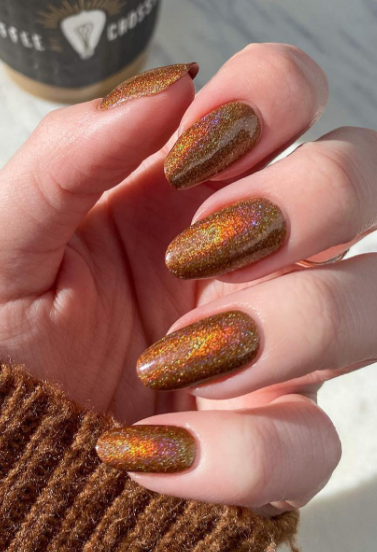 Lights Lacquer Cortadito nail polish. glitter gold orange nail polish. winter nails. january nails.