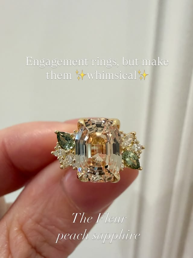 Unique emerald cut cluster engagement ring.