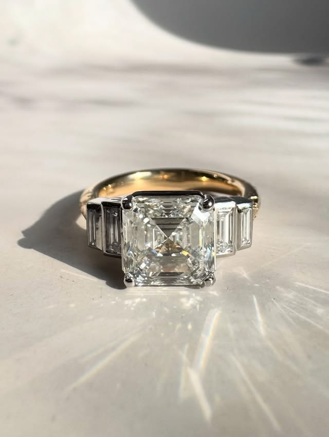 Five stone asscher cut diamond engagement ring.