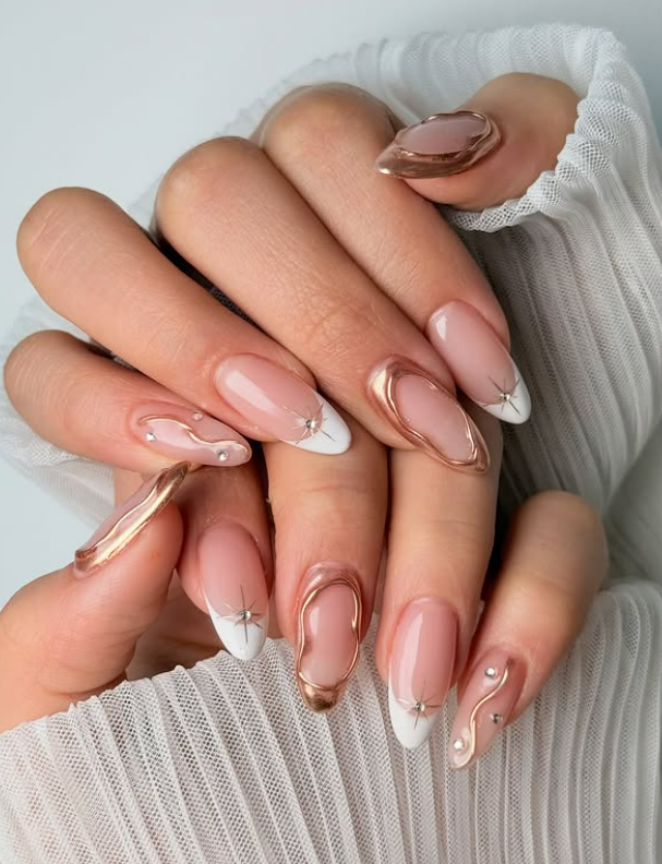 Almond gold celestial nail design Almond gold celestial nail design