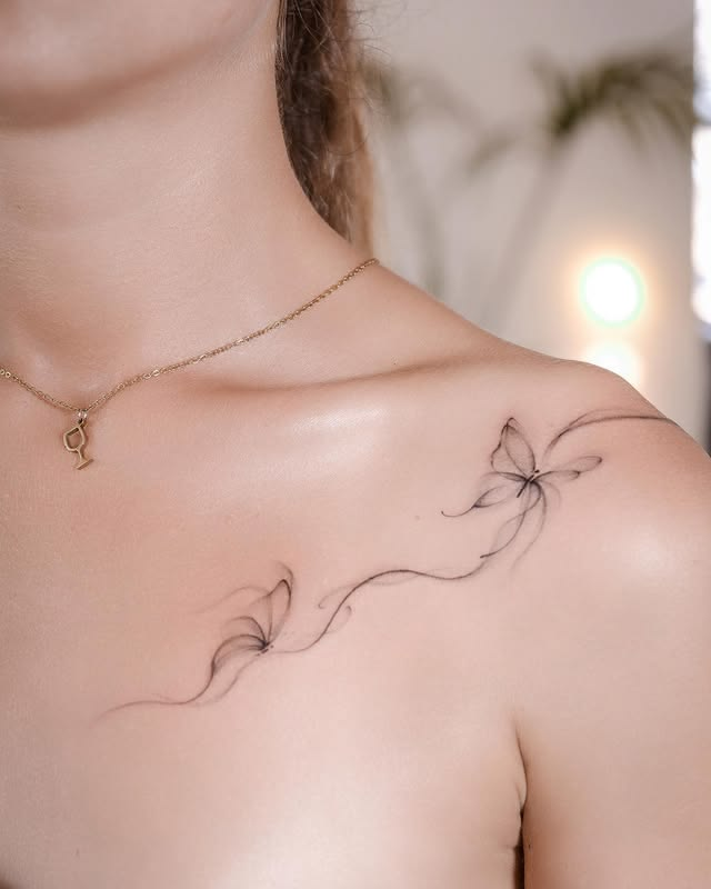 Dainty feminine shoulder tattoo ideas.