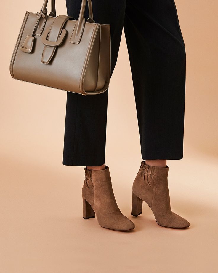 Beige fall suede ankle boots for fall pant outfit.