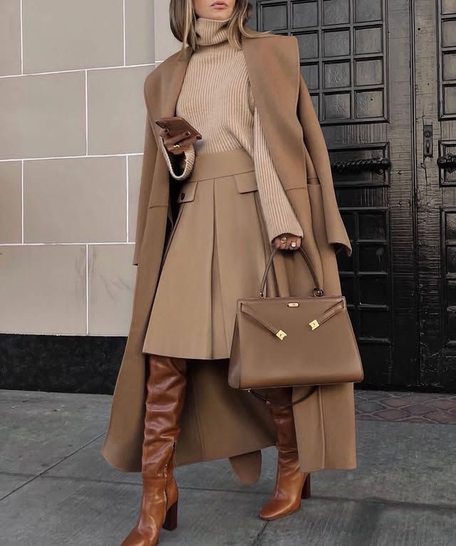 Beige old money fall outfit with knee high boots and skirt. Fall office outfit.