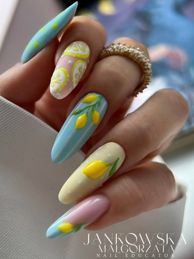 Bright summer citrus fruit nail art.