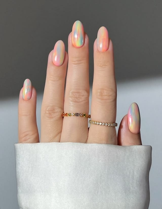 Opal sunset summer vacation acrylic nails.
