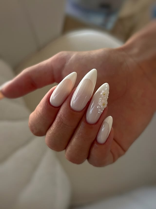 Milky white French bridal nails with flower details. Milky white French bridal nails with flower details. milky-white-flower-bridal-nails