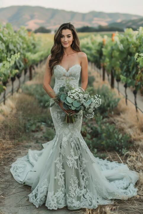 Mint green mermaid wedding dress with lace overlay. Mint green mermaid wedding dress with lace overlay.