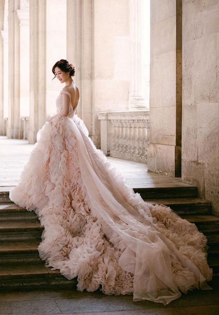 Monique L'Huillier pink tulle colored wedding dress. Blush pink wedding gowns. Monique L'Huillier pink tulle colored wedding dress. Blush pink wedding gowns.