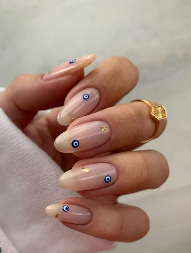 Nude summer nails with evil eye art Nude summer nails with evil eye art