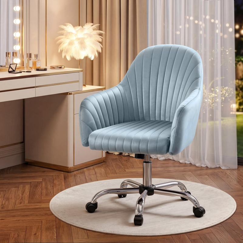 Velvet vanity chair with wheels.