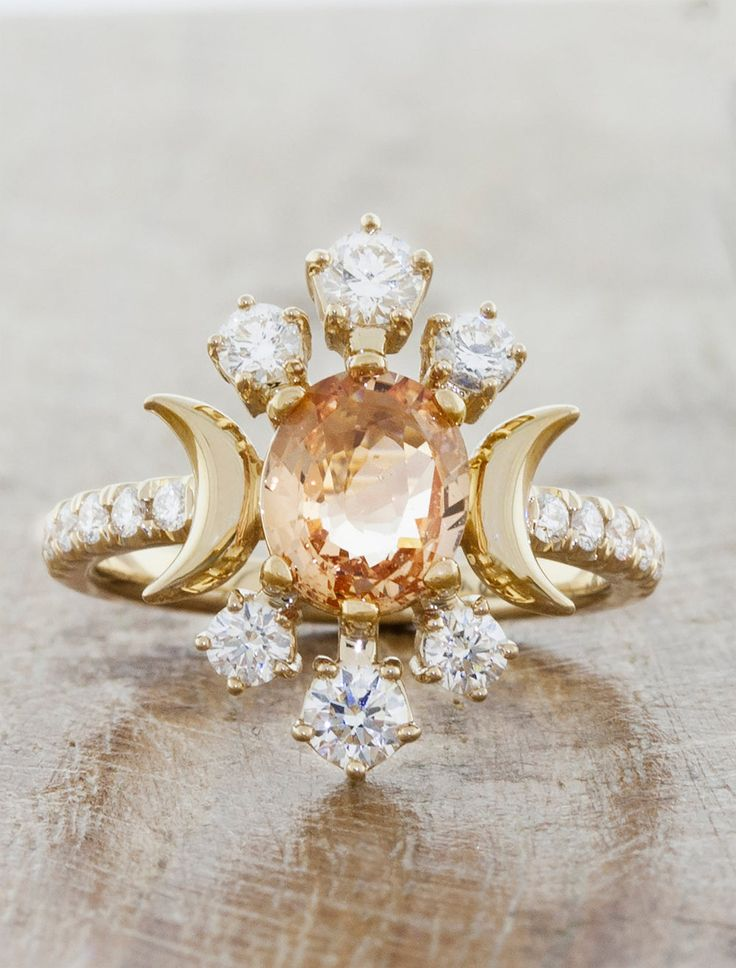 Vintage inspired peach and diamond sapphire colored engagement ring Vintage inspired peach and diamond sapphire colored engagement ring