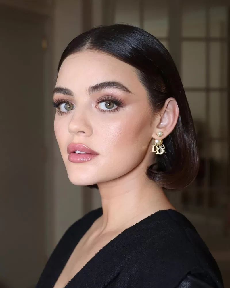 Dewy skin celebrity makeup trends. Lucy Hale makeup looks.