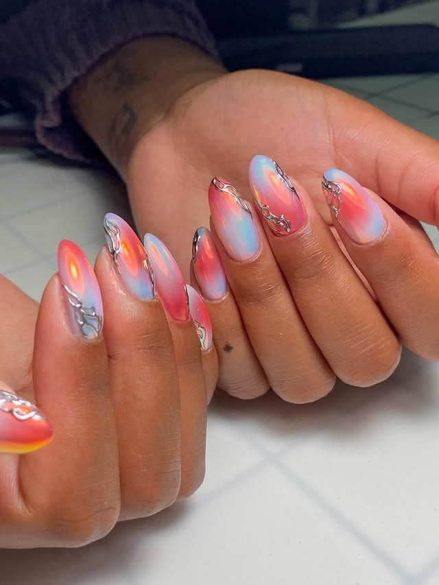 Blue and peach aura nails for summer.