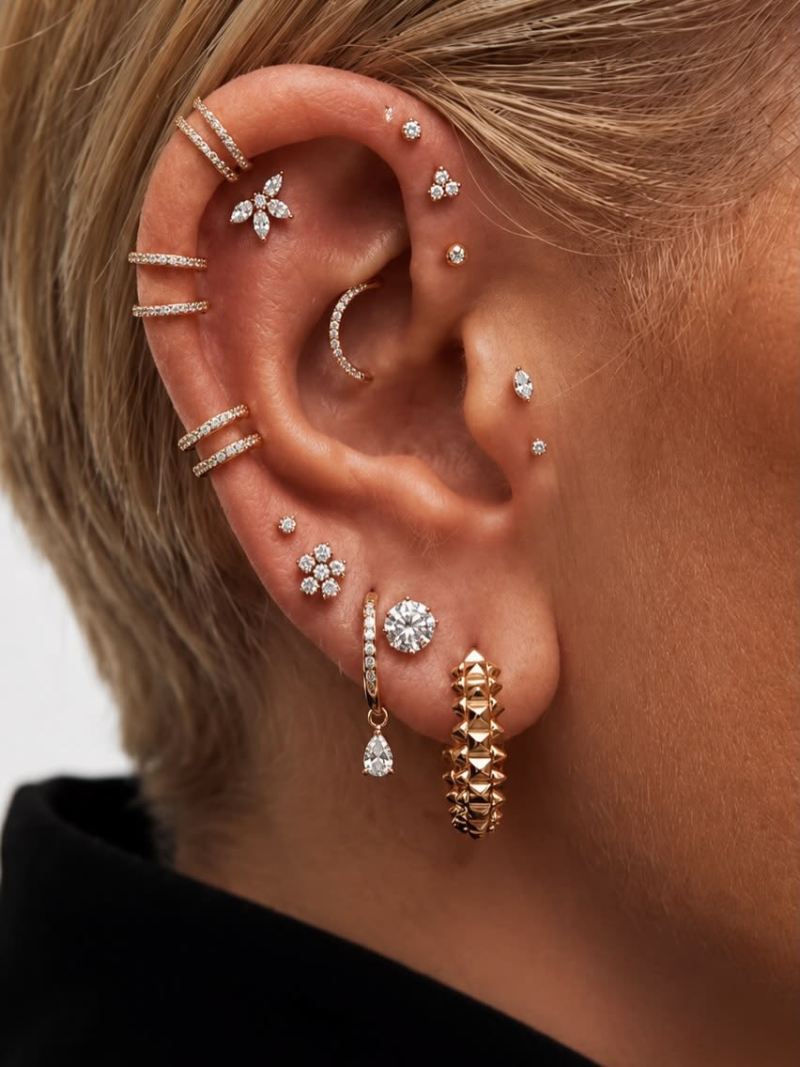 Coupled hoop earrings stack. Coupled hoop earrings stack.