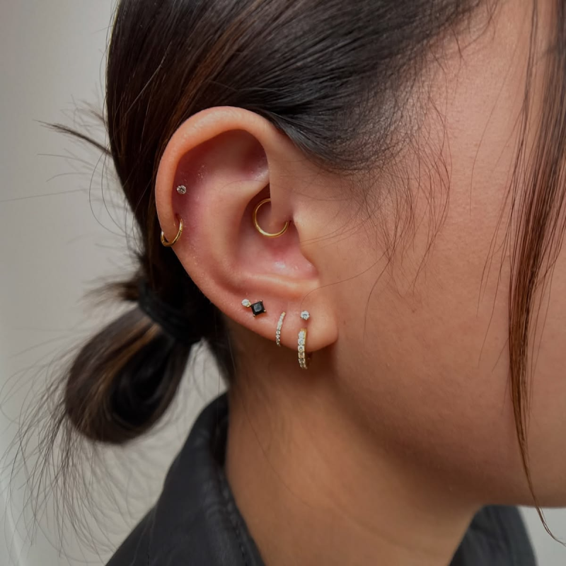 Minimalist ear piercing stack. Minimalist ear piercing stack.