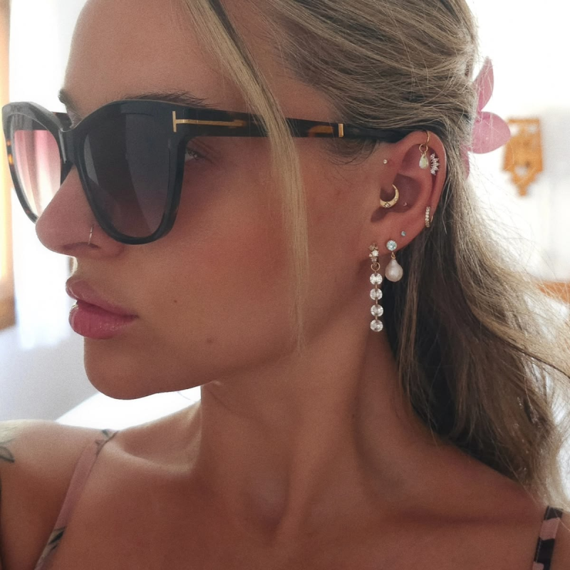 Dangle earrings stacked piercings. Dangle earrings stacked piercings.