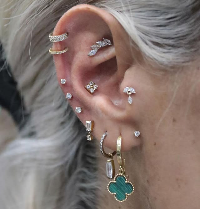 Earring studs and dangle earrings stack for multiple piercings. Earring studs and dangle earrings stack for multiple piercings.