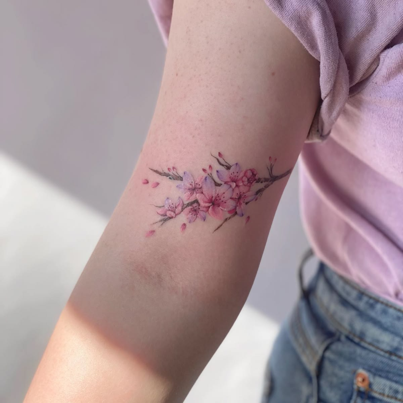 Elegant flower tattoos for women in color.